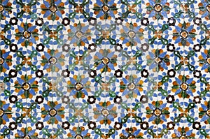 Moorish style ceramic flower tiles with geometrical patterns from Seville photo